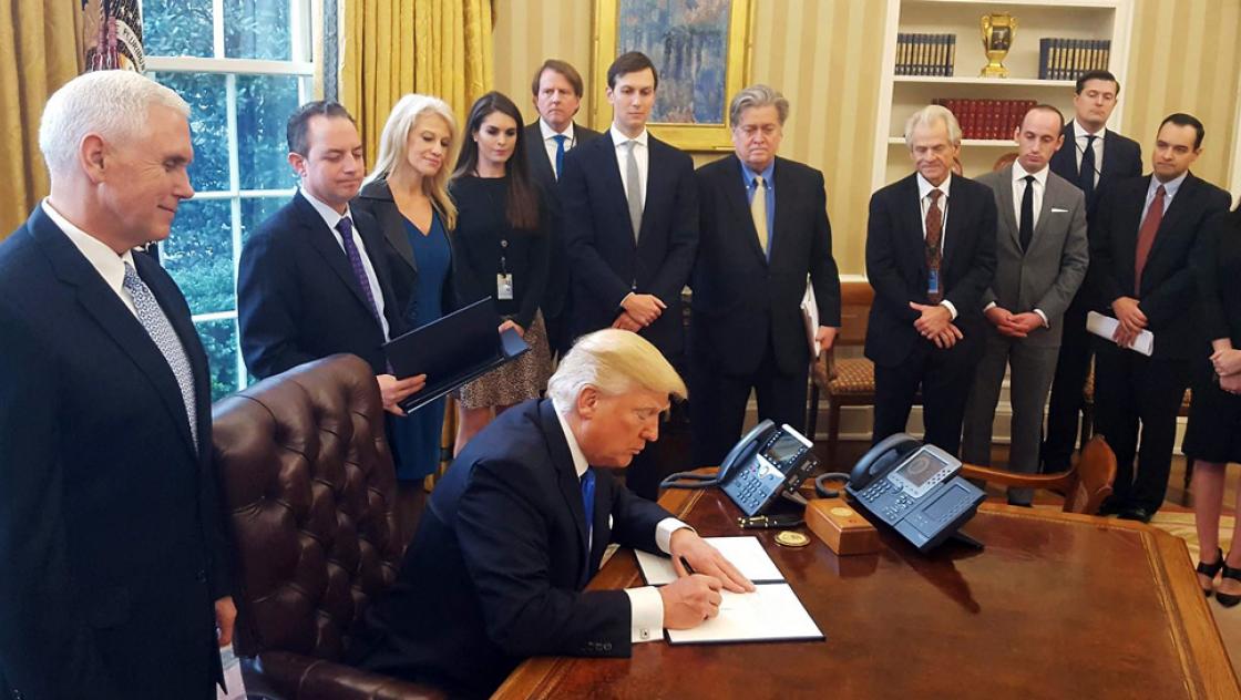 Public Domain|https://en.wikipedia.org/wiki/File:Donald_Trump_signs_Executive_Orders_January_2017.jpg