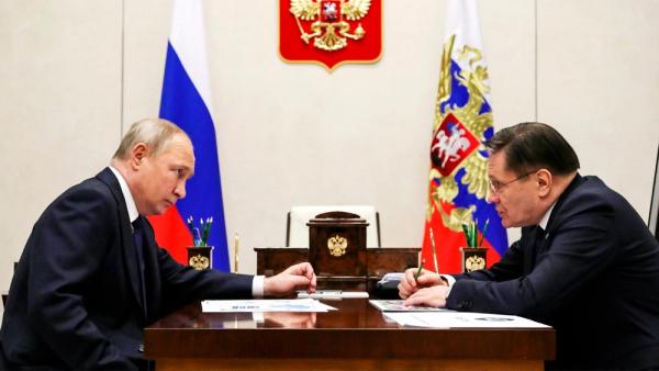 Wladimir Putin mit Alexej Lichatschow, Generaldirektor der staatlichen Atomenergiegesellschaft Rosatom, 19.5.2022 (IMAGO/ZUMA Wire)